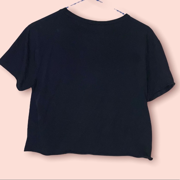 A crop top. Ripped from the center. Design  is Rock - Picture 6 of 6